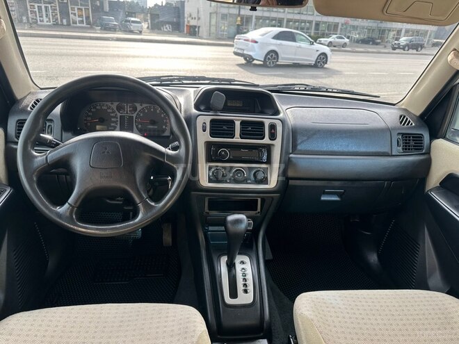 Mitsubishi Pajero io 2004, 249,000 km - 1.8 л - Bakı