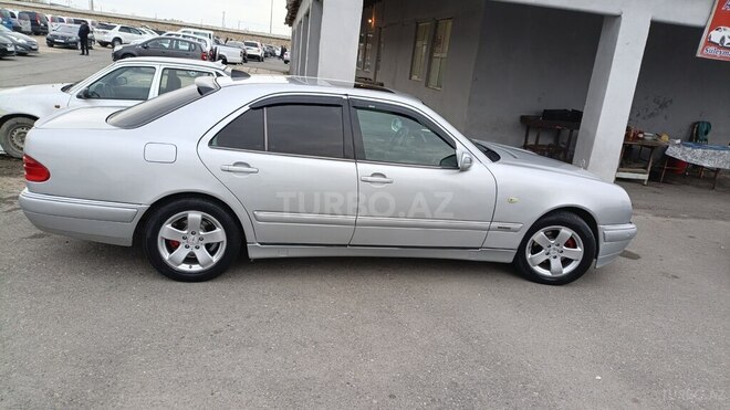 Mercedes E 240 1999, 313,583 km - 2.4 l - Bakı