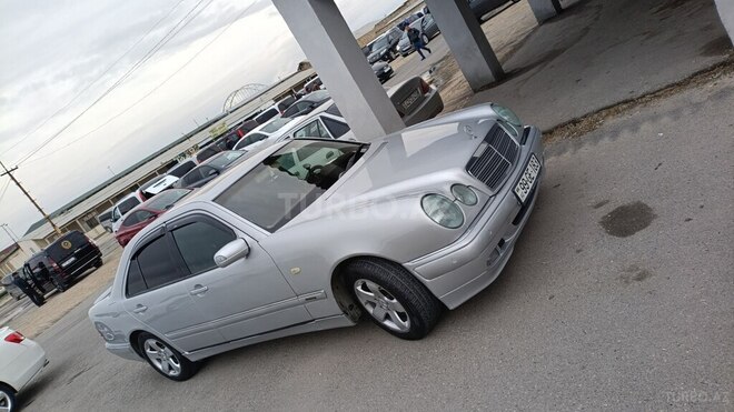 Mercedes E 240 1999, 313,583 km - 2.4 l - Bakı
