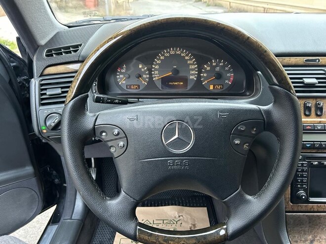 Mercedes E 320-7