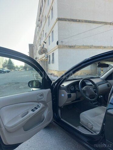 Nissan Sunny 2009, 217,000 km - 1.6 l - Bakı