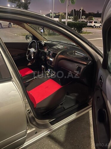 Nissan Sunny 2006, 325,000 km - 1.3 l - Bakı