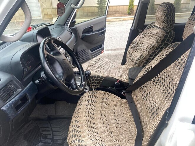 Mitsubishi Pajero io 1999, 172,000 km - 1.8 л - Bakı