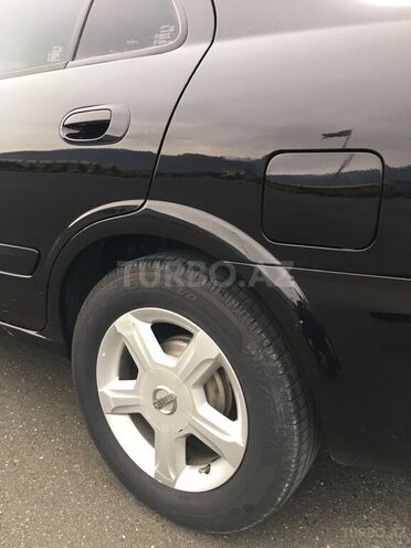 Nissan Sunny 2006, 248,000 km - 1.6 л - Qax