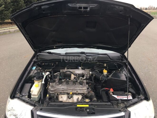 Nissan Sunny 2006, 248,000 km - 1.6 л - Qax
