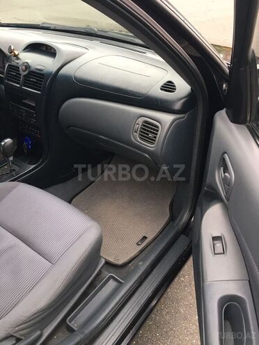 Nissan Sunny 2006, 248,000 km - 1.6 л - Qax