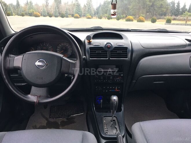 Nissan Sunny 2006, 248,000 km - 1.6 л - Qax