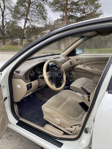 Nissan Sunny 2007, 355,707 km - 1.3 л - Quba