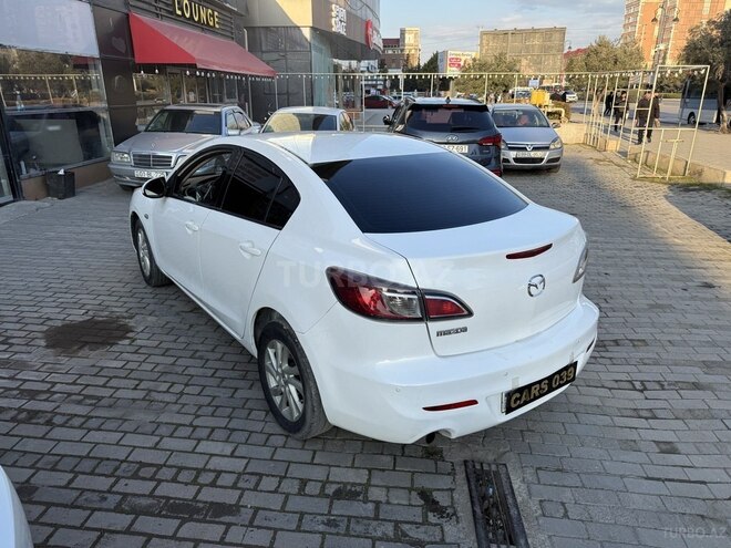 Mazda 3-13