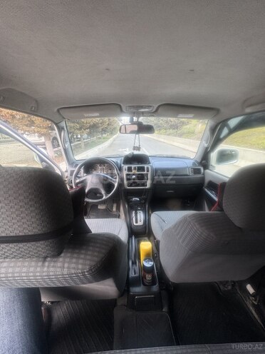 Mitsubishi Pajero io 1999, 339,000 km - 1.8 л - Bakı