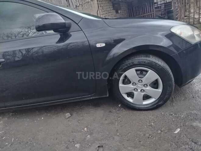 Kia  2009, 295,000 km - 1.4 l - Qəbələ