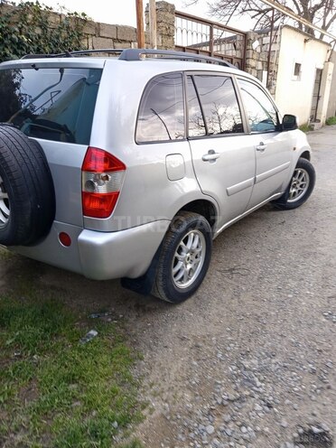 Chery Tiggo (T11)-11