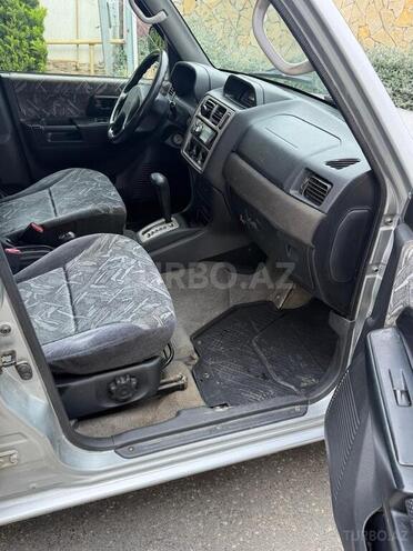 Mitsubishi Pajero io-9