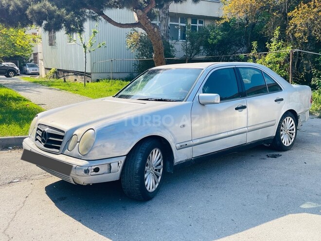 Mercedes E 230-4