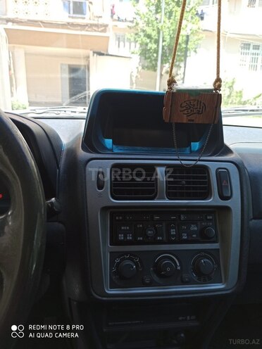 Mitsubishi Pajero io-5