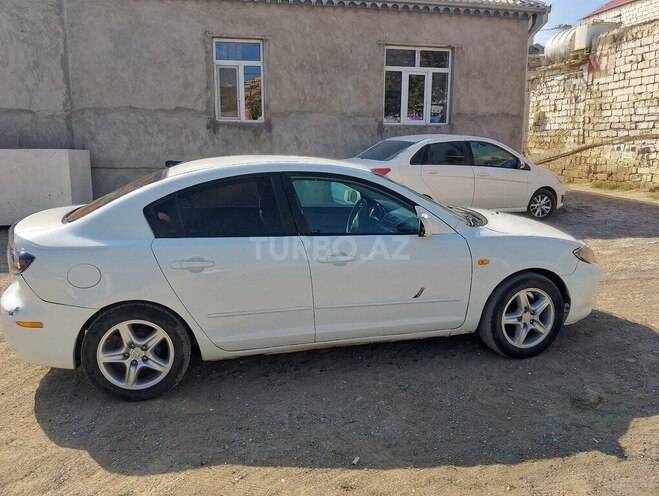 Mazda 3-7