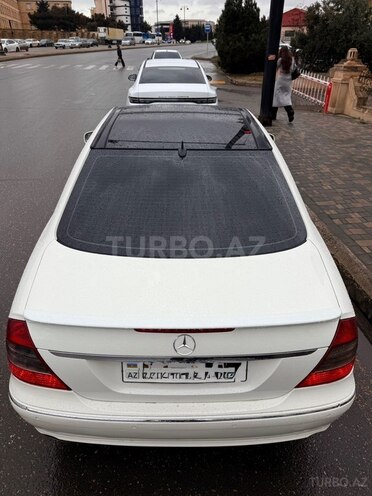Mercedes E 280-11