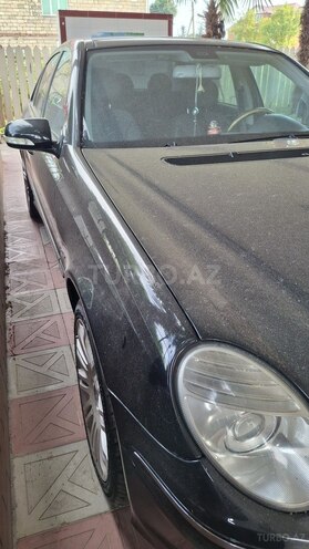 Mercedes E 280-11