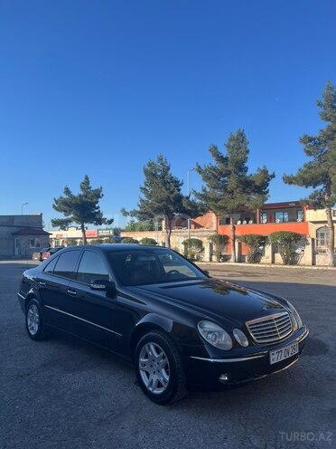Mercedes E 280-10