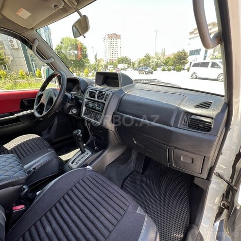 Mitsubishi Pajero io-9