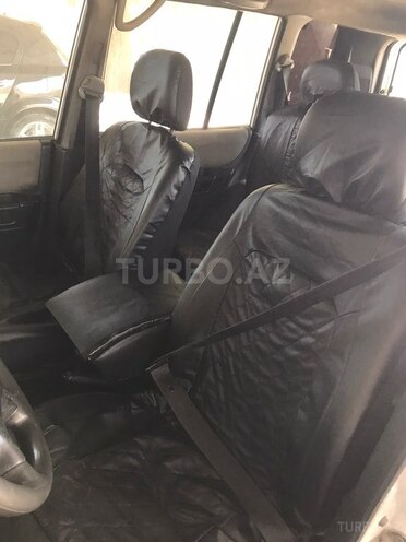 Mitsubishi Pajero io-5