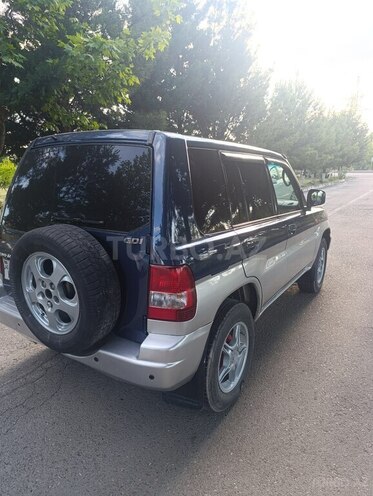 Mitsubishi Pajero io-5