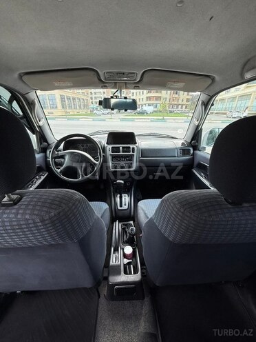Mitsubishi Pajero io-4