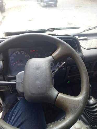 Isuzu NKR 55 E-11