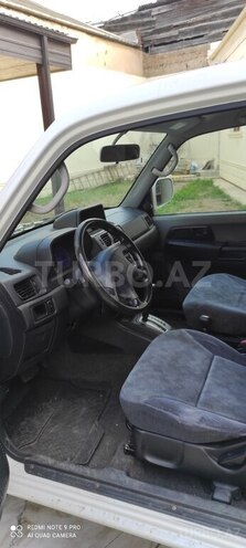Mitsubishi Pajero io-5