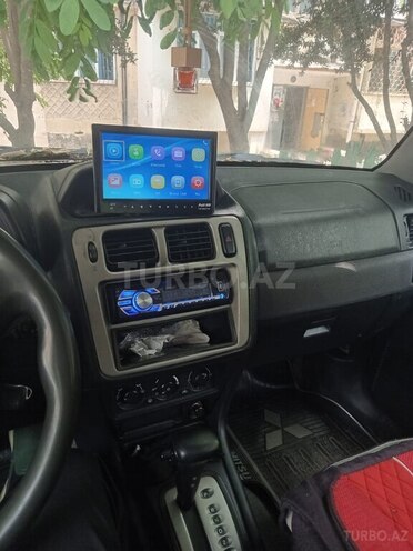 Mitsubishi Pajero io-4