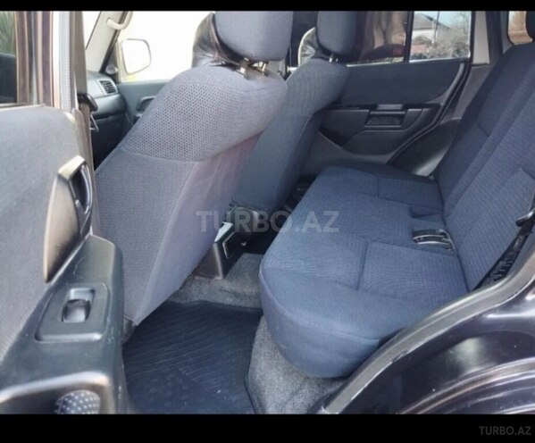 Mitsubishi Pajero io-9