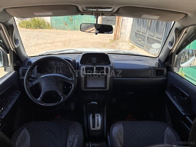 Mitsubishi Pajero io-4