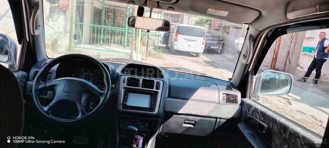 Mitsubishi Pajero io-7