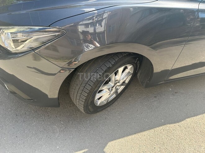 Mazda 3-12