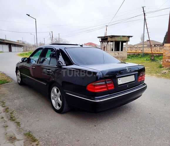 Mercedes E 320-7