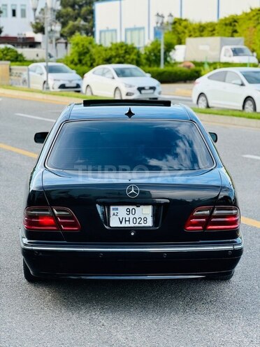 Mercedes E 320-7