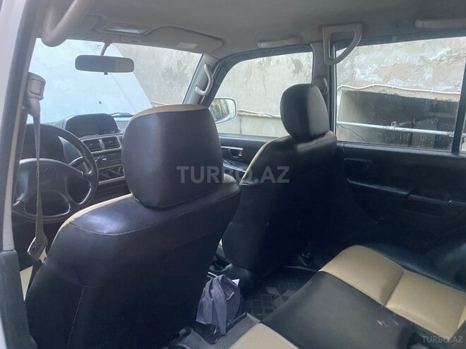 Mitsubishi Pajero io-3