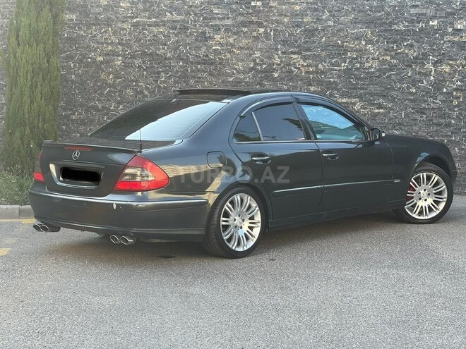 Mercedes E 320-11