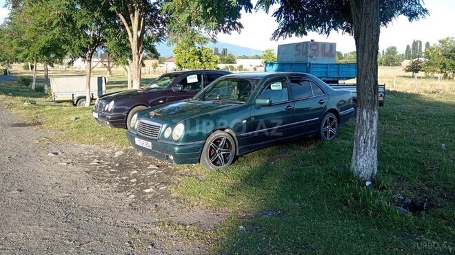 Mercedes E 230-7