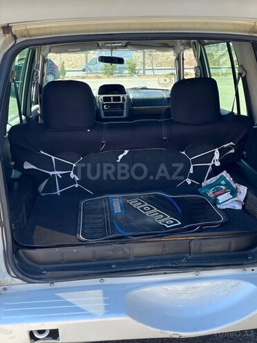 Mitsubishi Pajero io-5