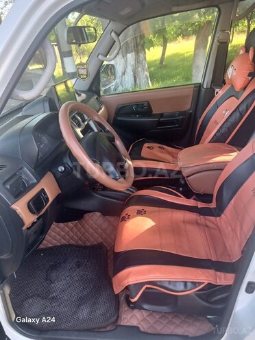 Mitsubishi Pajero io-5