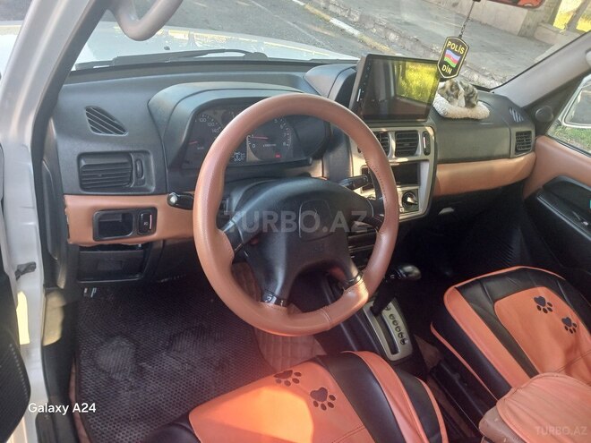 Mitsubishi Pajero io-4