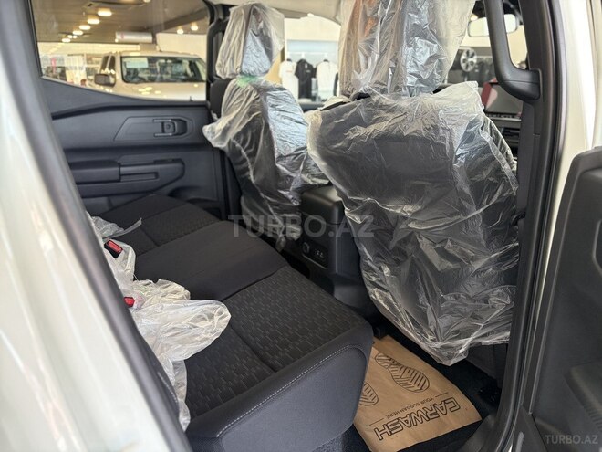 Mitsubishi L200-11