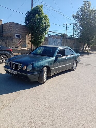 Mercedes E 320-7