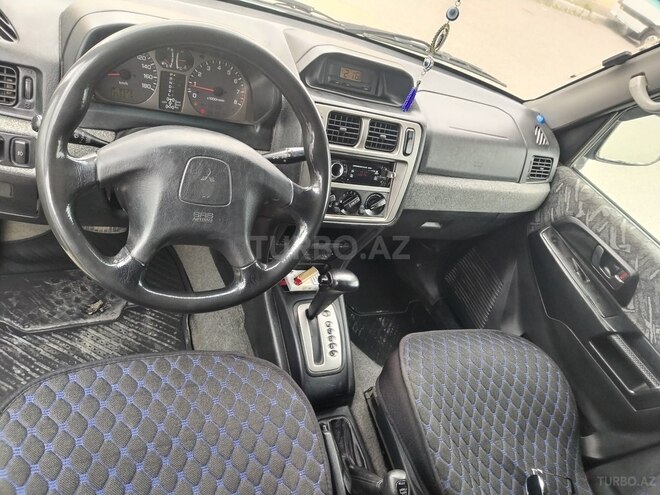 Mitsubishi Pajero io-9