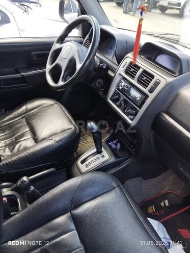 Mitsubishi Pajero io-3