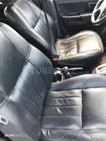 Mitsubishi Pajero io-7