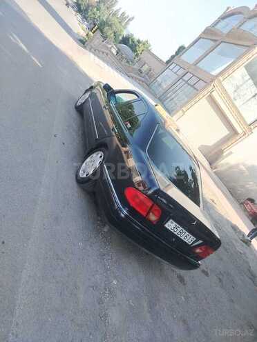 Mercedes E 230-11