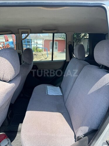 Mitsubishi Pajero io-5