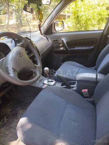 Chery Tiggo (T11)-4